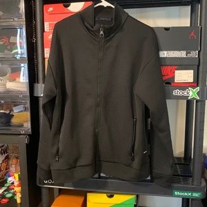 LOUIS VUITTON MONOGRAM ZIP-THROUGH TOP BLACK. WORN LIGHTLY WITH NO TEARS OR RIPS